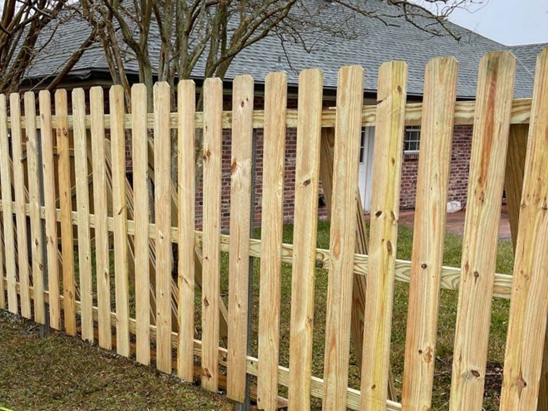 Chauvin LA cap and trim style wood fence
